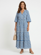 Melody | Vestido midi escalonado con estampado de rombos