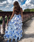 Lucy | Vestido midi floral con volantes