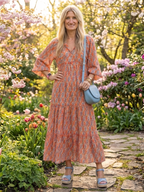 Chiara | Vestido midi con cuello en V, estratificado y estampado geometrico