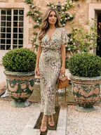 Coral | Vestido midi con estampado abstracto, cuello en V y cintura retorcida