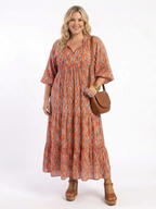 Chiara | Vestido midi con cuello en V, estratificado y estampado geometrico