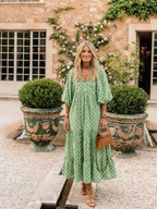 Gala | Vestido midi estampado con cuello en V y mangas tres cuartos