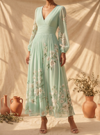 Mireya | Vestido midi verde claro con estampado floral